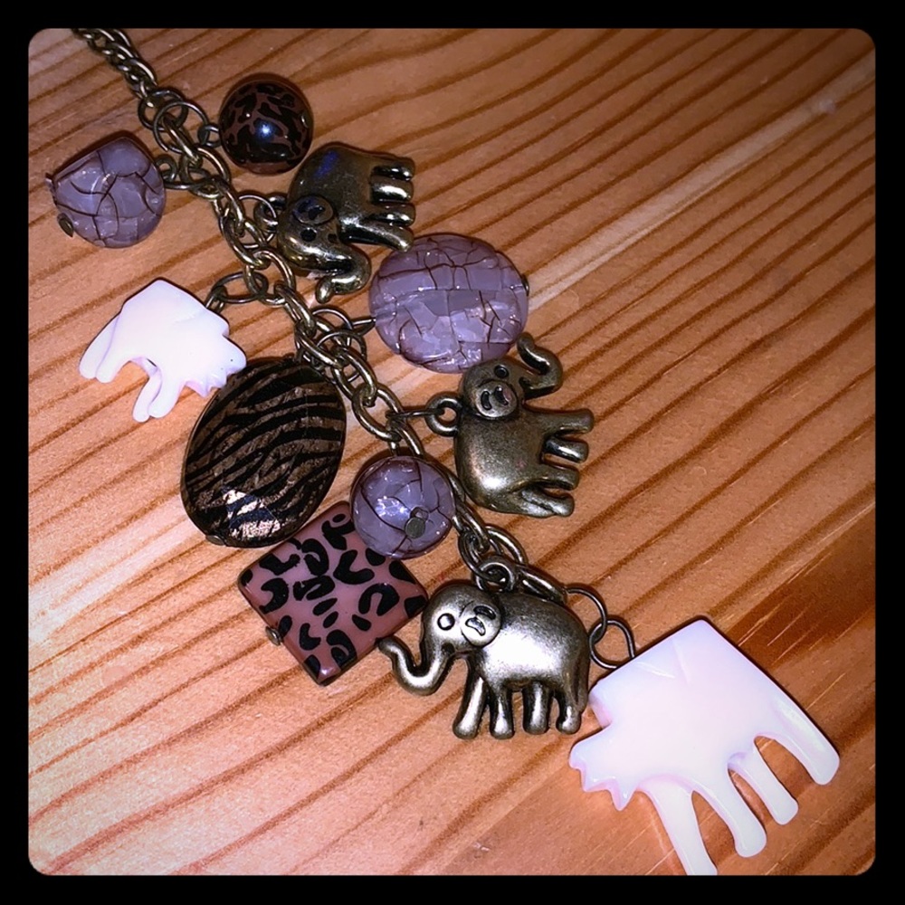 Long necklace elephant zebra cheetah purple stones